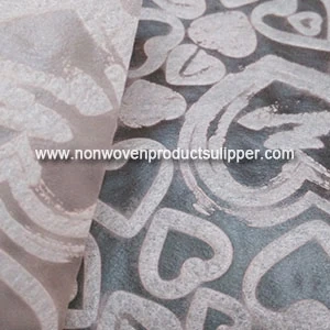 China Light Pink Heart-shaped Embossing GT-HSLIPI01 PP Spunbonded Non Woven High Quality Luxury Materials manufacturer