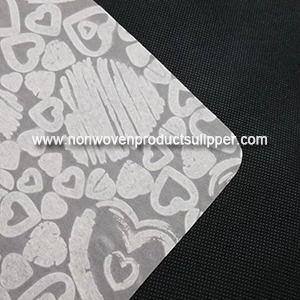 China Light Yellow Heart-shaped Embossing GT-HSLIYE01 PP Spunbond Non Woven Custom Wrapping Paper On Sales manufacturer