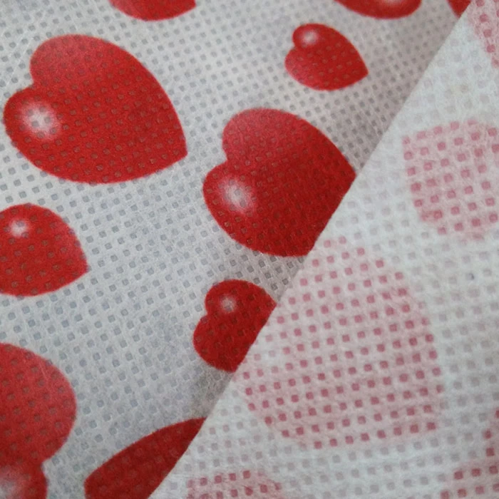 China Non Woven Polyester Fabric Supplier, Heart Shape Printing Polyester Spunbond Non Woven Fabric For Packaging JL-2025, PET Non Woven Factory manufacturer