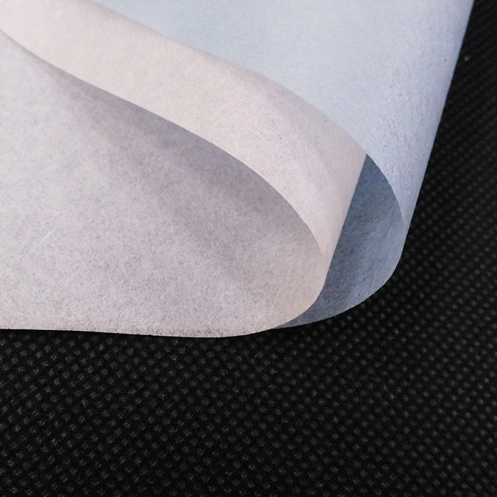 China Vegetable Fiber Smooth Eco-Friendly Wet-Laid Non Woven Fabric For Medical Gown And Caps Supplier manufacturer