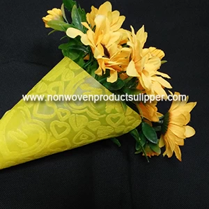 China Yellow Heart-shaped Embossing GT-HSTE01 PP Spunbonded Non Woven Gift Packaging Materials On Sales manufacturer