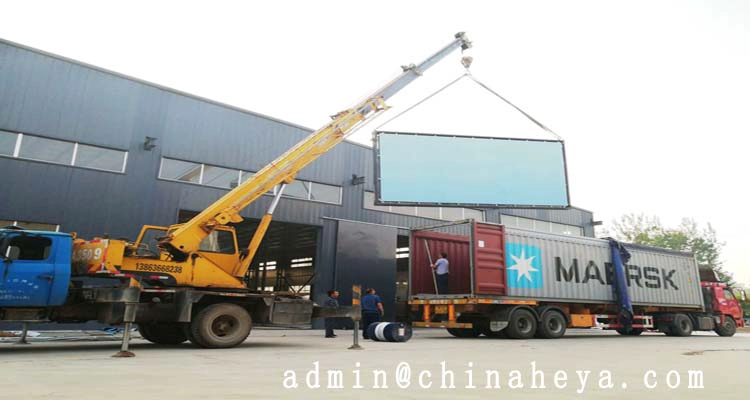 The workers are loading the house