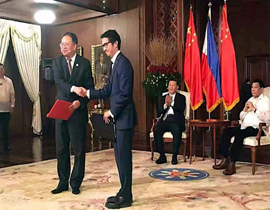 إعادة طبع: عقدين تم التوقيع عليهما بشهادة رؤساء الصين والفلبين