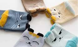 Why do socks pilling and how should they be removed?