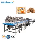 China Fully automatic biscuit packaging line egg roll cookies wafer biscuit cake feeding packing machine line manufacturer