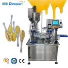 China Honey Spoon Filling Sealing Machine Rotation Honey Plastic Spoon Packaging Machine manufacturer