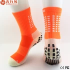China The best socks saler in China, wholesale orange nylon quick dry sport non slip socks manufacturer