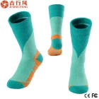 China vrouwen skiën verwarmde sokken, Groothandel douaneembleem Sportsokken fabrikant