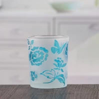 China Bels de vela de vidro colorido bonito pequenos suportes de vela de fantasia por atacado fabricante