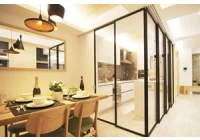 How to use a glass partition wall to create a stylish kitchen partition?