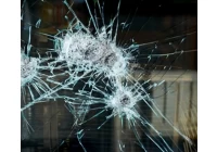 Why bullet proof glass can not be toughened glass?