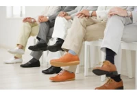 China Hoe dragen mannen sokken fabrikant