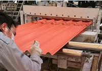 What is the production process and raw materials of PVC tiles?