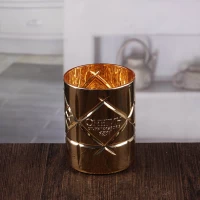 porcelana Sostenedores de la vela del palillo de oro en relieve la linterna del huracán candelabro al por mayor fabricante