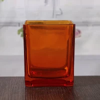 China Oranje grote glazen kaars houders groothandel glas vierkante kandelaar te koop fabrikant
