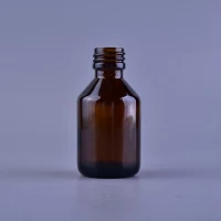 China Wholesale different capacity small amber glass bottle manufacturer