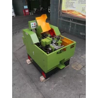 الصين China factory price and customized  nut former machine  nut tapping machine الصانع