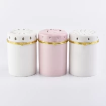 China Hochwertiger Luxuskeramikkerzenhalter mit Schnitzdekoration Pink Hersteller