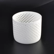 China hollow pattern matt white ceramic porcelain candle holder manufacturer
