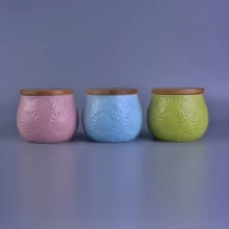 porcelana Tarros de vela de cerámica personalizados de venta caliente 18OZ con tapa de madera fabricante