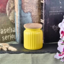 Čína 10 oz dýňové designové žluté keramické dózy na svíčky s bambusovým víkem výrobce