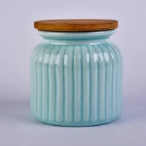 China pink pumpkin shape ceramic candle jar with wooden lid manufacturer