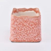 China Amber glazed square ceramic candle jar manufacturer