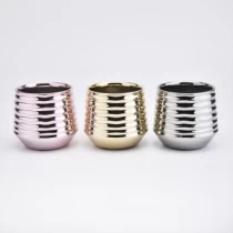 China Novos potes de vela de cerâmica dourada fabricante