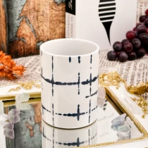 China New design pattern 400ml white ceramic candle holder supplier manufacturer