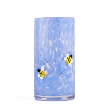 China Hot sale 16oz blue glass candle vessels with bee pattern candle jars manufacturer