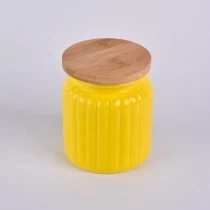 China 6oz Yellow ceramic candle holder with lids for home decoration manufacturer