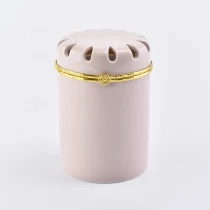 China unique design full sets pink  ceramic candle jar with lid manufacturer