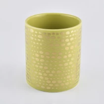 China Hot selling bulk gold decorative unique ceramic candle jar for wedding manufacturer