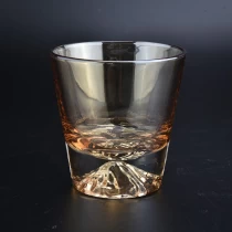 China transparent luxury amber brown peak glass candle jar manufacturer