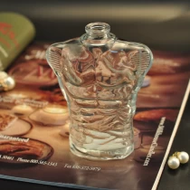 China 100ml Transparent glass embossed oil essential spray perfume bottle home decorative manufacturer