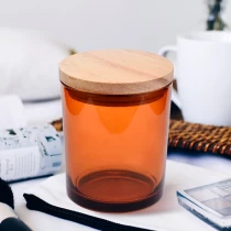China Wholesale Amber glass candle jars with wood lids manufacturer
