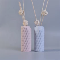 China Fragrance woven pattern ceramic aroma diffuser bottle with reed for home decor supplier manufacturer