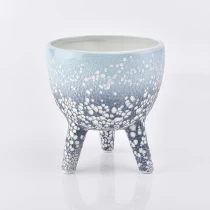 China Tripus design home decoration ceramic candle holder unique candlestick manufacturer