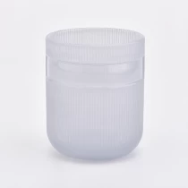 China Embossed new design glass candle holder wedding gift wholesale 5oz fragrance soy wax manufacturer