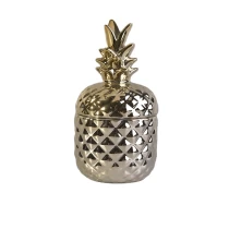 China Pineapple golden ceramic candle container with lid for home decoration manufacturer