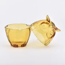 China Customized recycled decorative glass gold candle jars with lids manufacturer