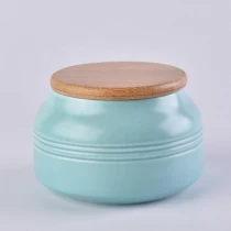 China Wholesales decorative blue ceramic candle container with wood lids manufacturer