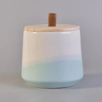 China Sunny luxury blue custom logo ceramic candle jars with wood lid manufacturer