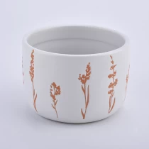 中国 14盎司圆柱形上釉陶瓷烛台，罐身带花朵图案，批发价 制造商
