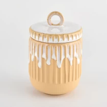 Tsina matte orange glazing ceramic candle jars with lids for aromas Manufacturer