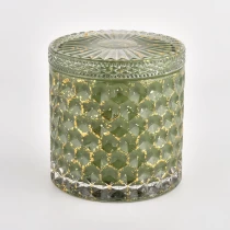 China Weihnachtsgrünes Korbgeflecht-Muster Glaskerzenglas mit Glasdeckel Hersteller