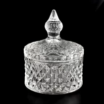China Newly design 140ml diamond effect glass candle jar with handle lids for supplier manufacturer