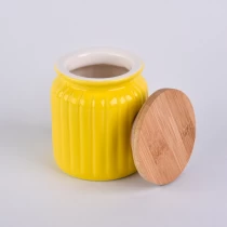 China Yellow ceramic candle container with bamboo lid manufacturer