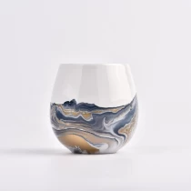 Cina Portacandele in ceramica di forma rotonda da 450 ml di vendita calda con nuovo effetto pittura per il commercio all'ingrosso produttore