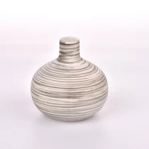 porcelana Botella de aceite perfumada de cerámica de 330 ml con botellas difusoras de cañas al por mayor fabricante